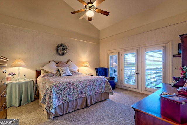 carpeted bedroom with ceiling fan, access to outside, and vaulted ceiling