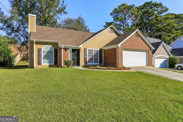 view of front of house with a front lawn and a garage