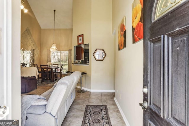 foyer entrance featuring a high ceiling