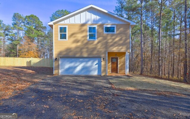 front of property featuring a garage