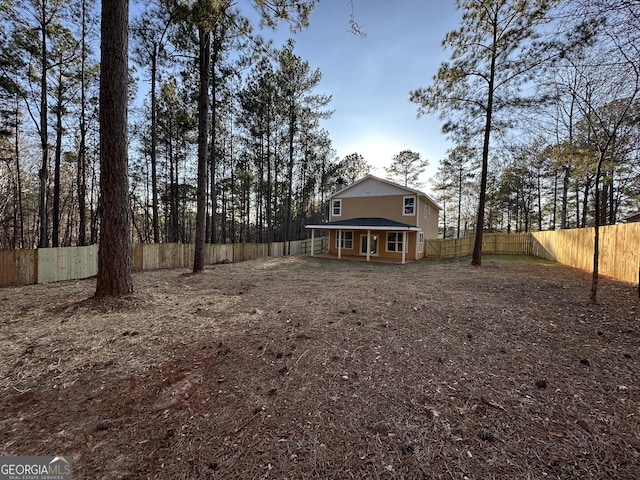 view of yard featuring a fenced backyard