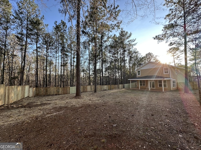 view of yard with a fenced backyard