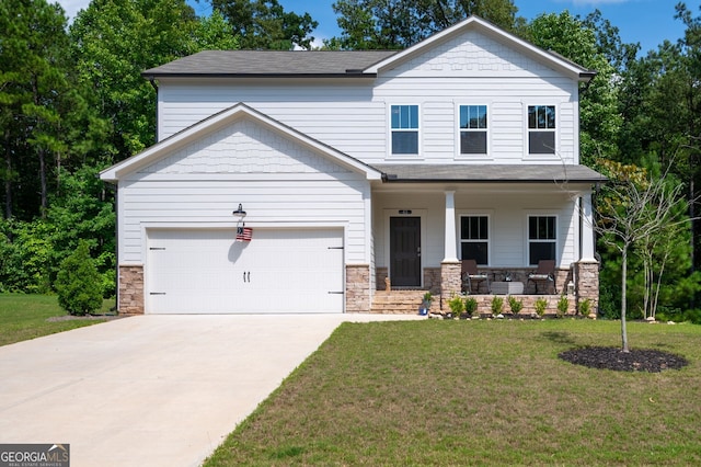 view of front facade featuring covered porch, a front yard, and a garage