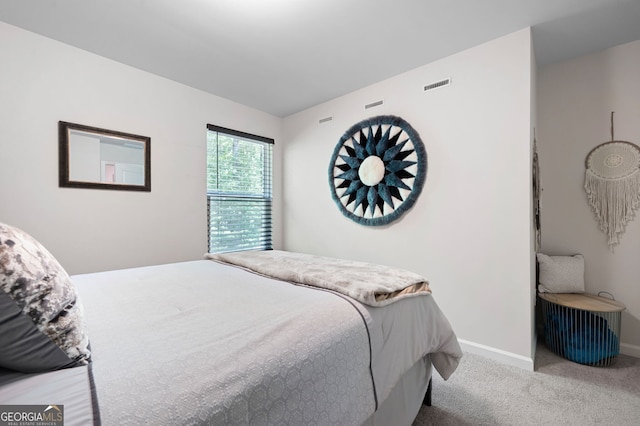 bedroom featuring carpet