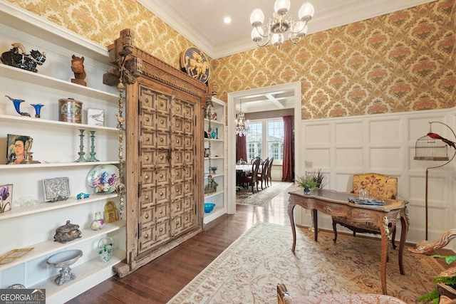 office area featuring a chandelier, dark hardwood / wood-style flooring, and crown molding