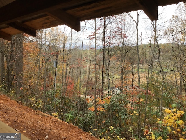 view of landscape with a view of trees