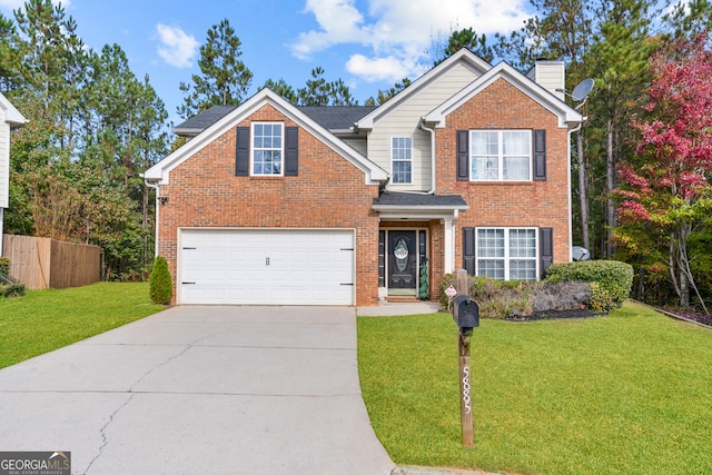 view of front of house with a front yard and a garage