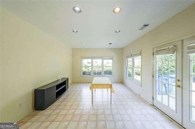 unfurnished sunroom with a healthy amount of sunlight