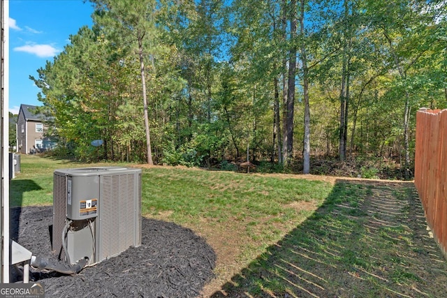 view of yard with central AC unit