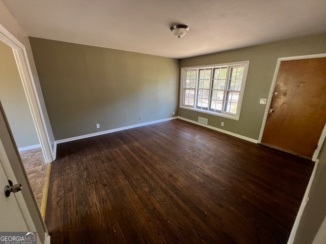 interior space featuring dark hardwood / wood-style flooring