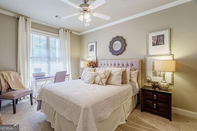 carpeted bedroom featuring ceiling fan and ornamental molding