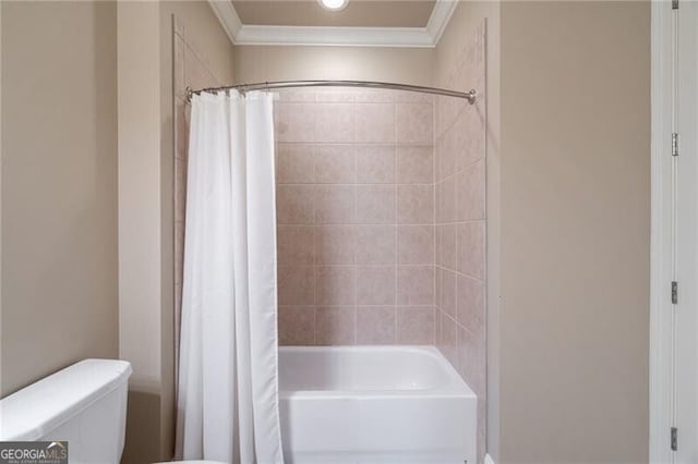 bathroom with shower / bath combination with curtain, toilet, and crown molding