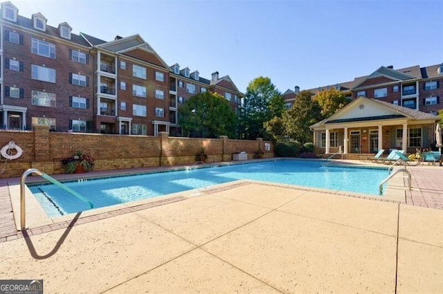 view of pool featuring a patio