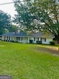 view of front of property with a front lawn