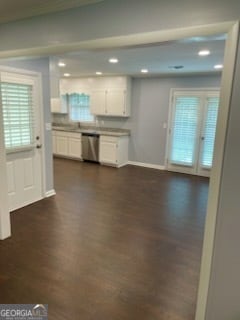 kitchen with white cabinetry, dishwasher, and dark wood-type flooring