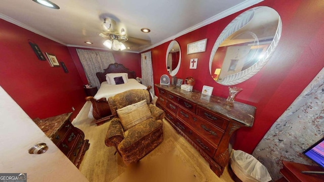 bedroom featuring ornamental molding and ceiling fan