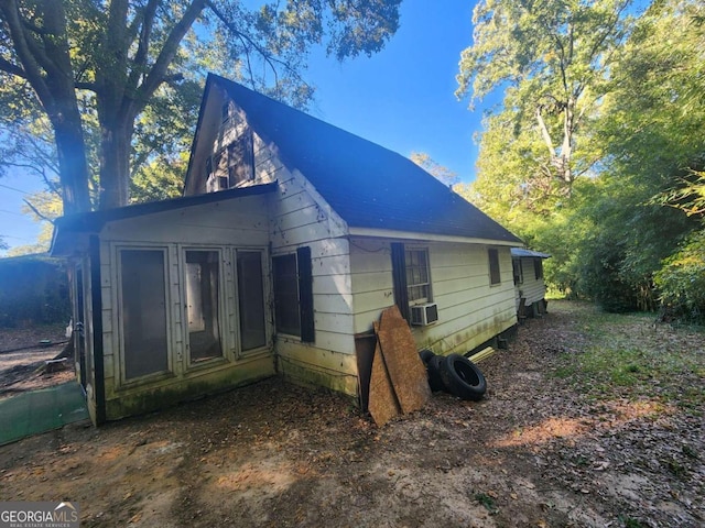 view of home's exterior featuring cooling unit