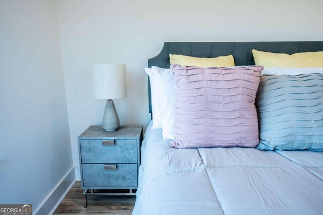 bedroom featuring hardwood / wood-style floors