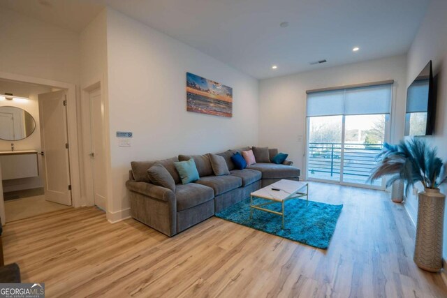 living room featuring light wood-type flooring