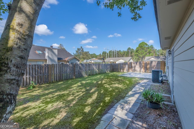 view of yard featuring a patio area and cooling unit