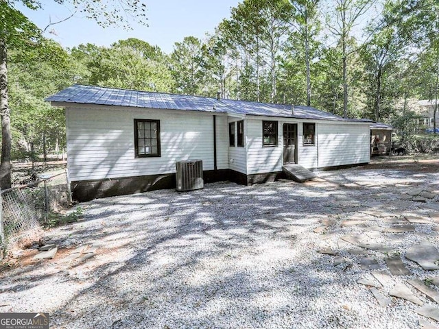 view of front of house with central AC unit