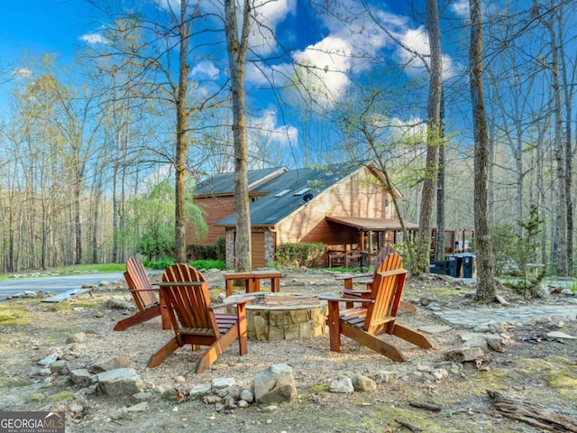 view of patio / terrace with an outdoor fire pit