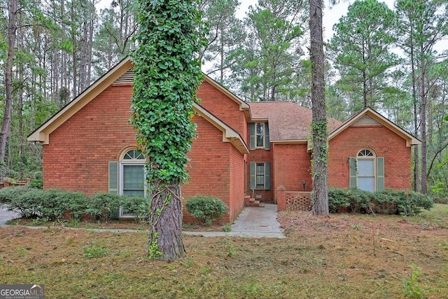 front of property with a front yard