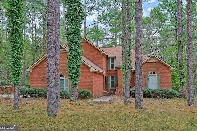 view of property with a front lawn