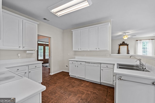 kitchen featuring sink, dishwasher, french doors, ceiling fan, and white cabinets