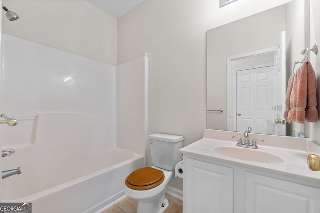 full bathroom featuring vanity, toilet, tile patterned floors, and washtub / shower combination