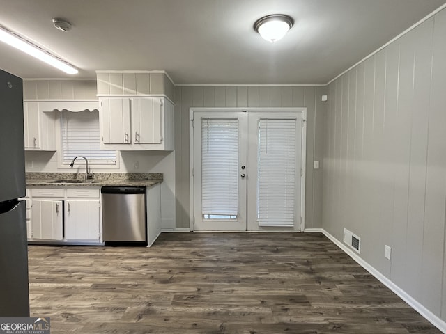 kitchen featuring french doors, dark hardwood / wood-style floors, stainless steel appliances, sink, and white cabinets