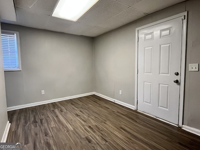 empty room featuring dark wood-type flooring