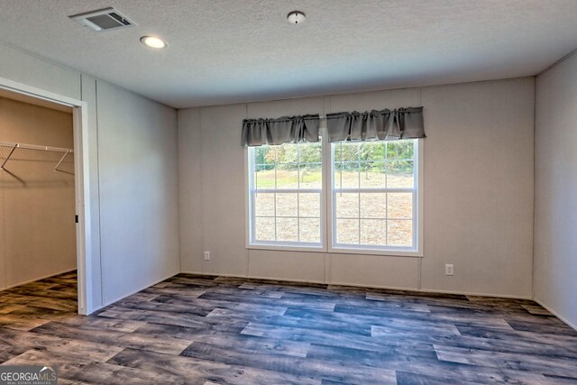 full bathroom with vanity, bathtub / shower combination, hardwood / wood-style floors, and toilet