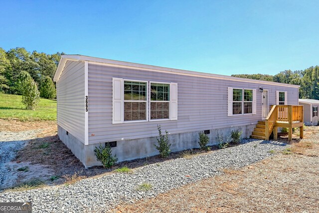 view of front facade featuring a deck