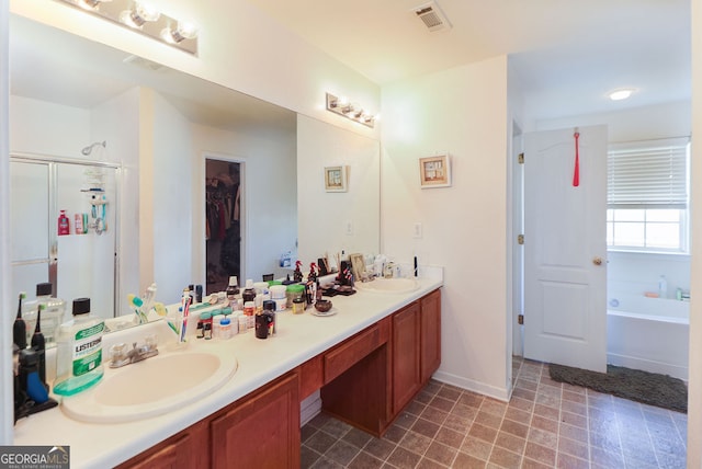 bathroom with vanity and plus walk in shower