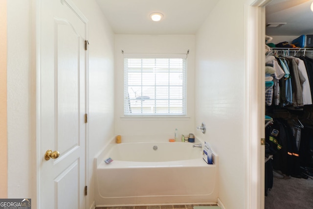 bathroom with a tub