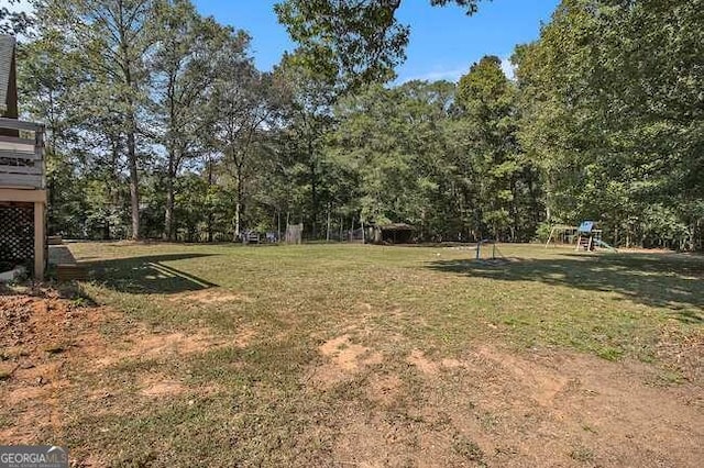 view of yard with a playground