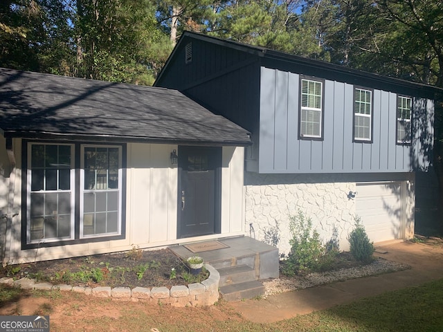 view of front of home with a garage