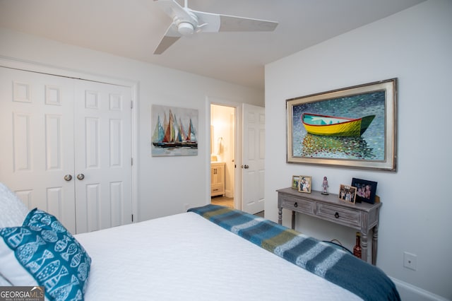 bedroom with a closet, ensuite bath, and ceiling fan