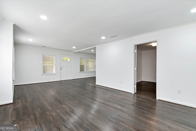 empty room featuring dark hardwood / wood-style floors