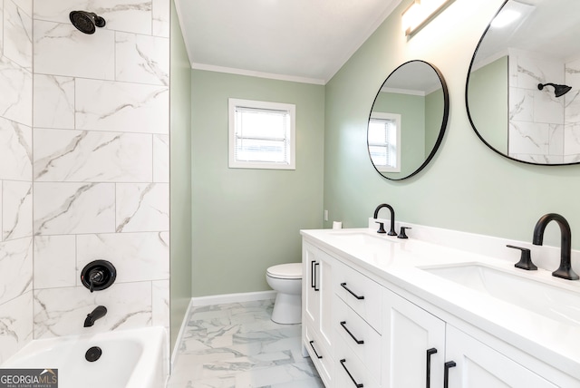 full bathroom featuring tiled shower / bath, ornamental molding, vanity, and toilet