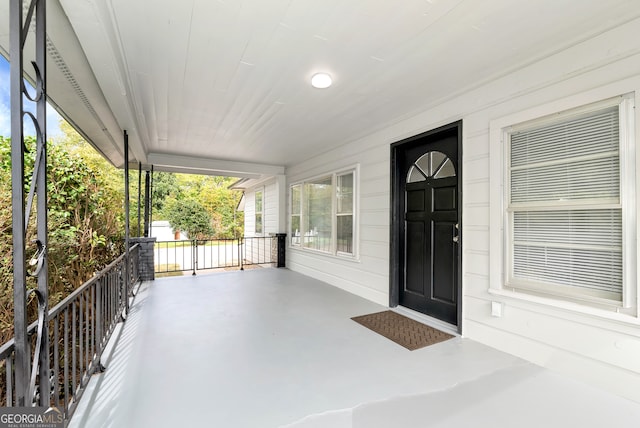 entrance to property with covered porch