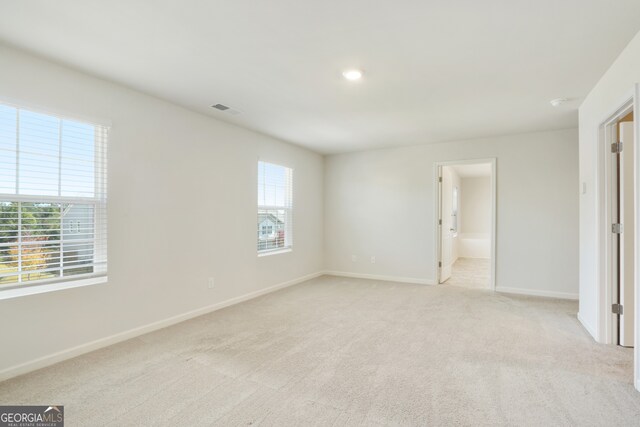 view of carpeted spare room