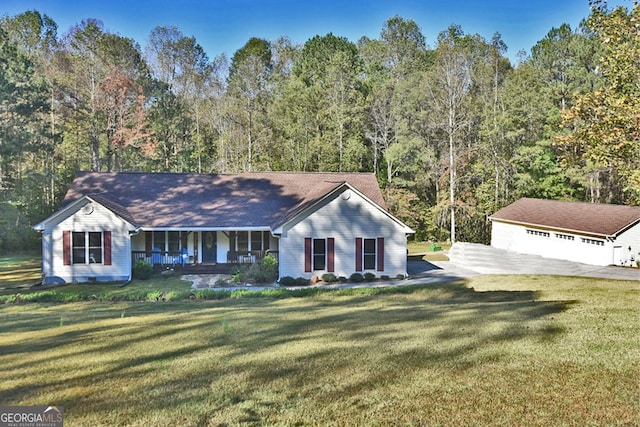 view of front of house with a porch and a front yard