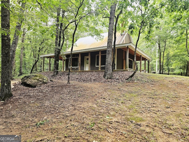 4153 Glenn Rd, Franklin, GA 30217 - view of front facade with metal roof and covered porch