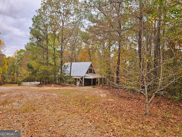 view of yard featuring a sunroom