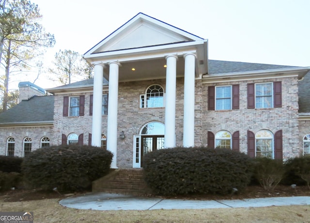 view of greek revival inspired property