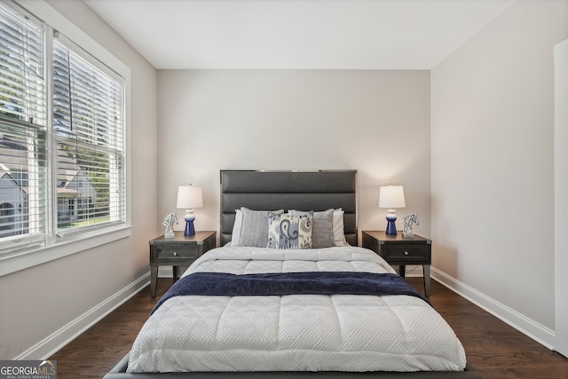 bedroom featuring dark hardwood / wood-style floors