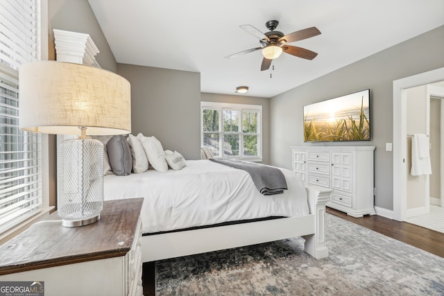 bedroom featuring dark wood-type flooring and ceiling fan