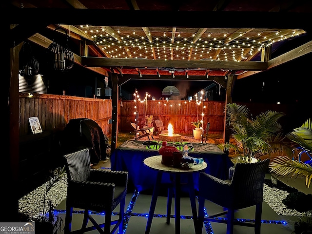 view of patio with a pergola and a grill